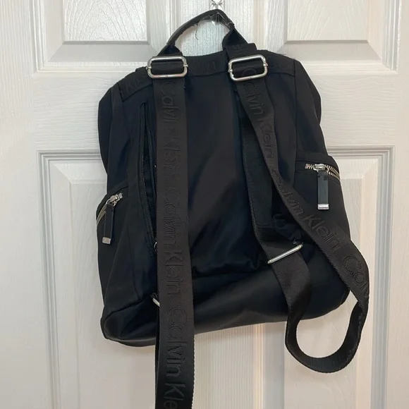 CALVIN KLEIN // black fashion backpack // fold over // TONS of zipper pockets - Picture 8 of 16